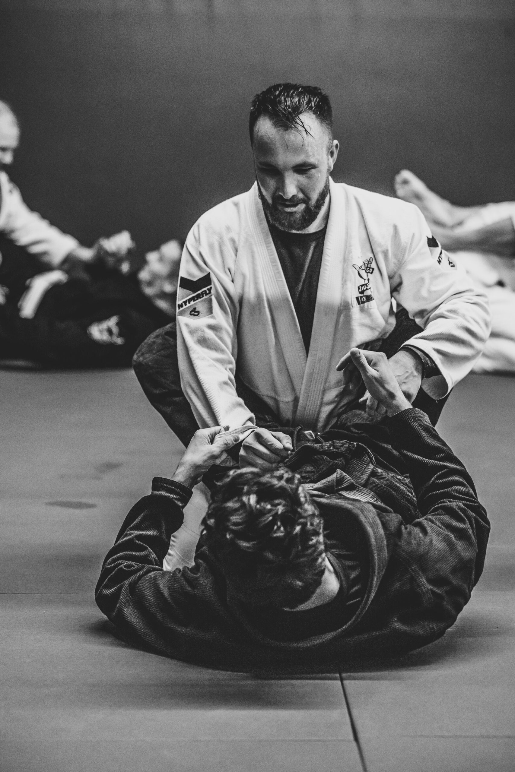 Brazilian Jiu Jitsu training at Pangea - close-up of guard pass technique