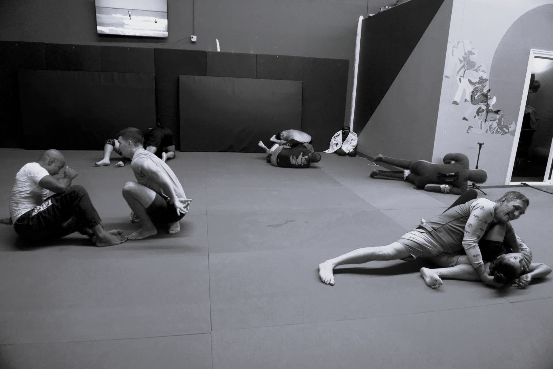 Open Mat session at Pangea Jiu Jitsu - training pairs on the mats